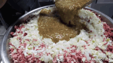 a bowl of meat and vegetables with the words made in animatica at the bottom