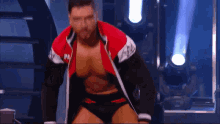a man in a red and white jacket with the letter pa on the front