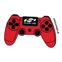 a red video game controller with silicon labs on it