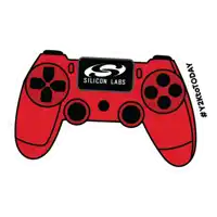 a red video game controller with silicon labs on it