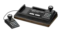 an old bpf mp 1000 video game console with two joysticks