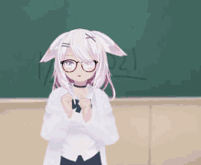 a girl with white hair and glasses stands in front of a blackboard with the numbers 1 and 2 on it