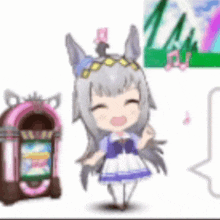 a little girl is standing next to a jukebox .