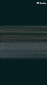 a blurred image of a person 's face with a caption that says capcut