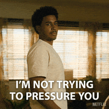 a man in a white shirt says i 'm not trying to pressure you on a netflix poster