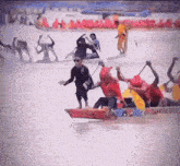a group of people are rowing a boat that says ' we fully weigh one ' on the side
