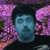 a man in a black shirt with a purple background