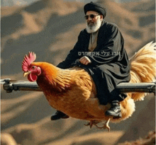 a man in a black robe is riding a rooster on a railing ..