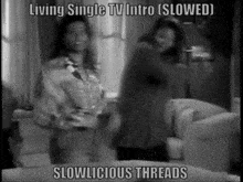 a black and white photo of two women dancing with the caption living single tv intro ( slowed ) slowlicious threads