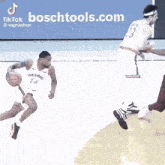 a basketball player in a cleveland uniform is dribbling the ball