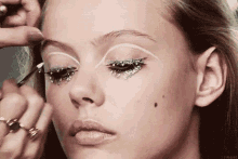 What’s Fake About You GIF - Fashion Make Up Glitter GIFs