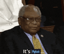 a man in a suit and tie says it 's pigfuck on the bottom