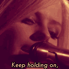 Avril Lavigne Keep Holding On GIF - Avril Lavigne Keep Holding On Never Let Go GIFs