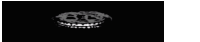 a black and white drawing of a smiling face on a black background