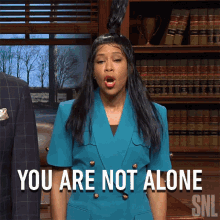 You Are Not Alone Regina King GIF - You Are Not Alone Regina King Saturday Night Live GIFs