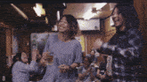 a blurry picture of a group of people with the letter d in the lower right corner