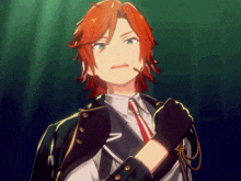 a man with red hair and green eyes is wearing a suit and tie