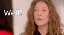 a woman with red hair is asking well