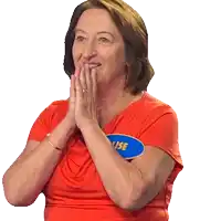 a woman wearing a red shirt with a blue name tag that says ' louise ' on it