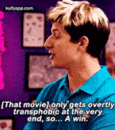 a man in a blue shirt is talking about a movie that gets overly transphobic at the very end