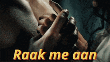 a man and a woman holding hands with the words raak me aan in yellow letters