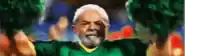a man with a beard is wearing a green shirt with a yellow collar .