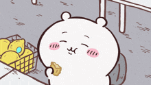 a cartoon drawing of a bear with a basket of lemons behind it