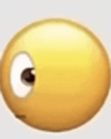 a close up of a yellow smiley face with a black eye .