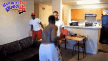 a group of men are standing in a living room with a sign above them that says hai me no lopo