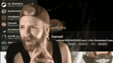 a man with a beard is standing in front of a screen that says exocoatl