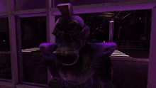 a room with purple lights and a sign that says come back room