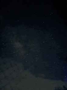 a dark night sky with lots of stars