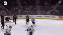 a hockey game is being played with a sn logo in the corner