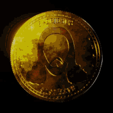 a gold coin with wings and the word believe
