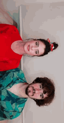 a man and a woman are posing for a picture together