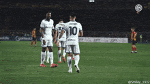 a soccer player with the number 10 on the back of his shirt