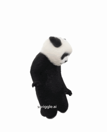 a black and white panda bear is standing in front of a white background that says oviiggle.ai on it