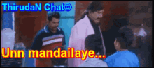 a group of people standing in front of a sign that says thiruda chat