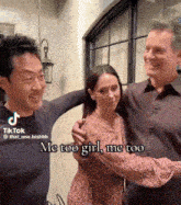 two men and a woman are posing for a picture with the caption " me too girl me too "