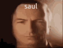 a close up of a man 's face with the name saul written above it