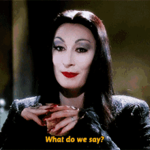 What Do We Say Morticia GIF - What Do We Say Morticia Addams GIFs