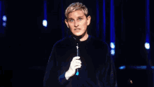 ellen degeneres speaking into a microphone with the words " i gotta get the fuck outta here " below her