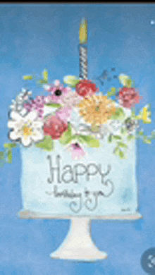 a birthday cake with flowers and a candle on it