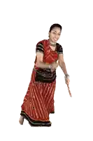 a woman in a red and black dress is holding two sticks in her hands