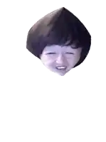 a close up of a person 's face with a huge smile on it .
