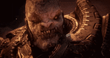 a close up of a monster with a tire on his back