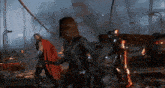 thor black widow and iron man are standing in a destroyed city