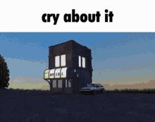 a car is parked in front of a small building with the words `` cry about it '' written on it .