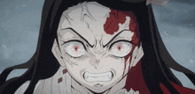 a close up of a girl with blood coming out of her eyes