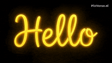 a neon sign that says hello in yellow on a black background